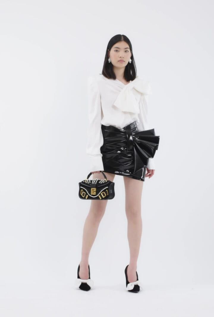 Short leather skirt with mini monogram print
